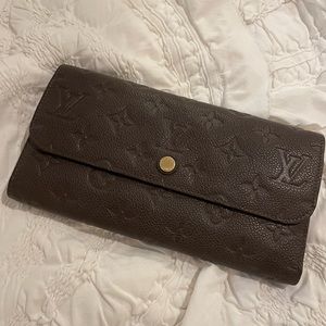 Louis Vuitton monogram empreinte long wallet brown